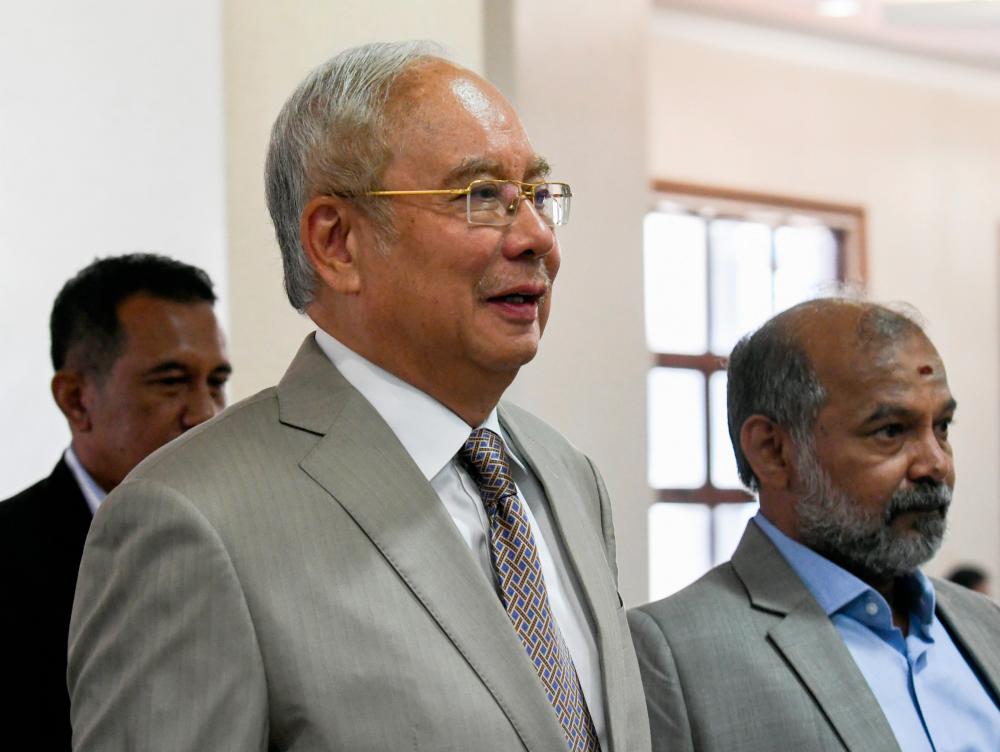 Former prime minister Datuk Seri Najib Abdul Razak arrives at the Kuala Lumpur Court Complex today. - Bernama