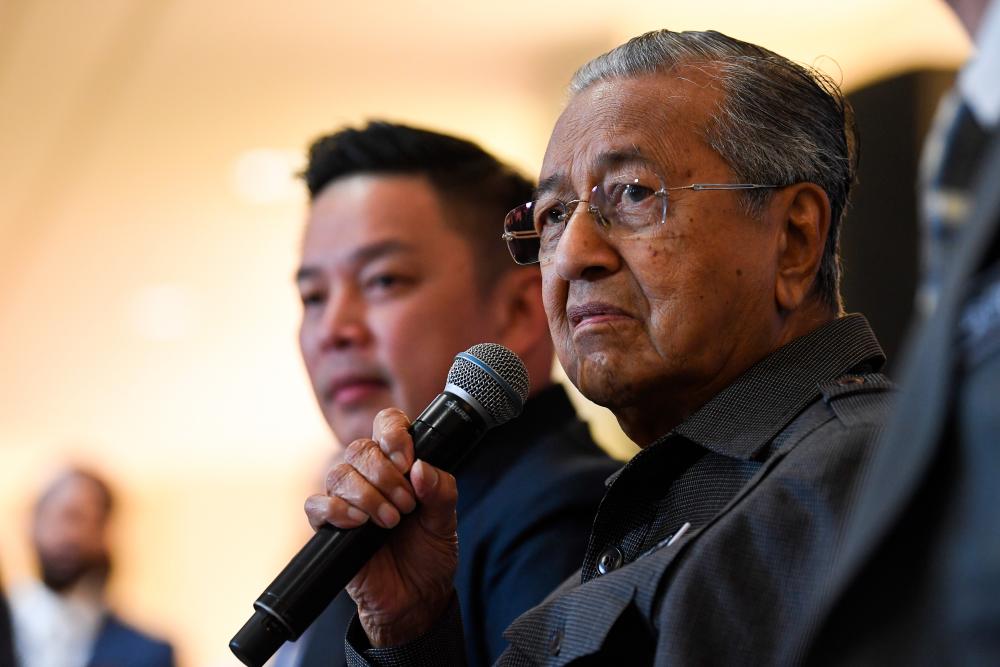 Prime Minister Tun Dr Mahathir Mohamad speaking during the Launching Ceremony of National Automotive Policy (NAP 2020) Press Conference at the Ministry of International Trade and Industry (MITI) today.  — Bernama
