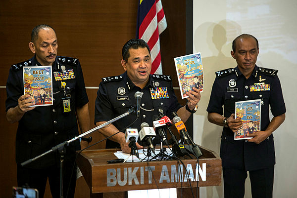Bukit Aman Criminal Investigation director Datuk Huzir Mohamed speaking at a media conference in Bukit Aman Police Headquarters today. — Bernama