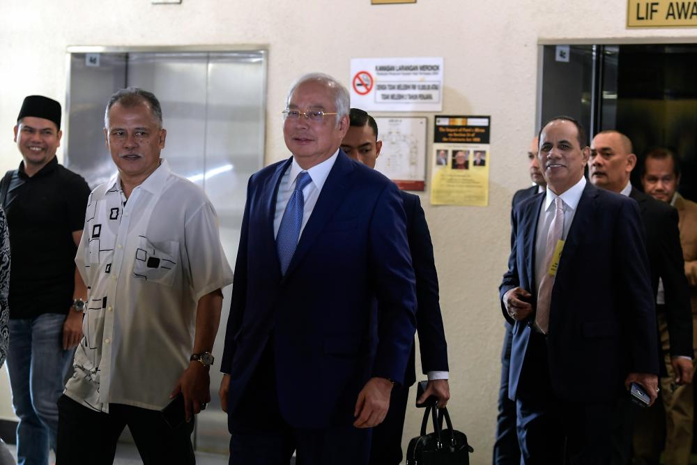 Former prime minister Datuk Seri Najib Abdul Razak attends the first day of his 1Malaysia Development Berhad (1MDB) trial at the Kuala Lumpur Court Complex on Aug 28, 2019. - Bernama