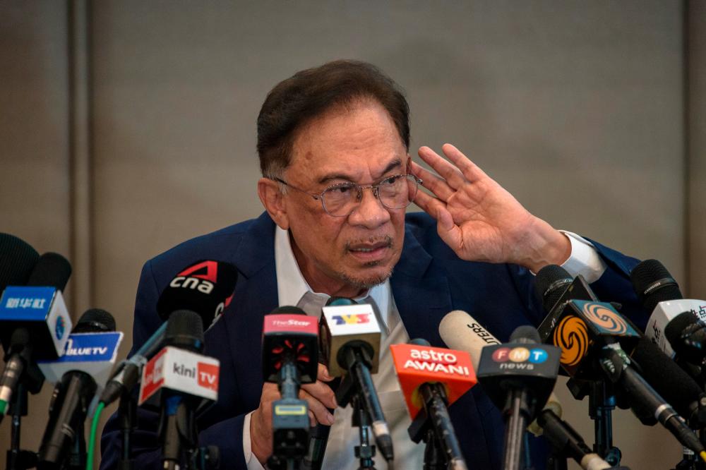 PKR president Datuk Seri Anwar Ibrahim during a press conference today. — Bernama