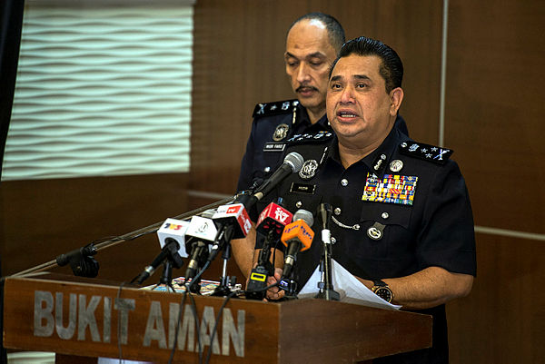 Federal police CID director Comm Datuk Huzir Mohamed speaking at a press conference in Bukit Aman today. — Bernama