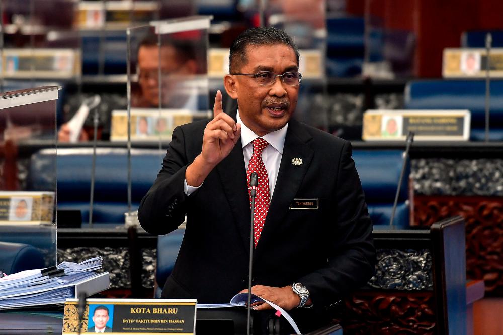 Minister in Prime Minister’s Department (Law) Datuk Takiyuddin Hassan speaks in Parliament during his winding-up speech on the Motion of Thanks for the Royal Address today. - Bernama