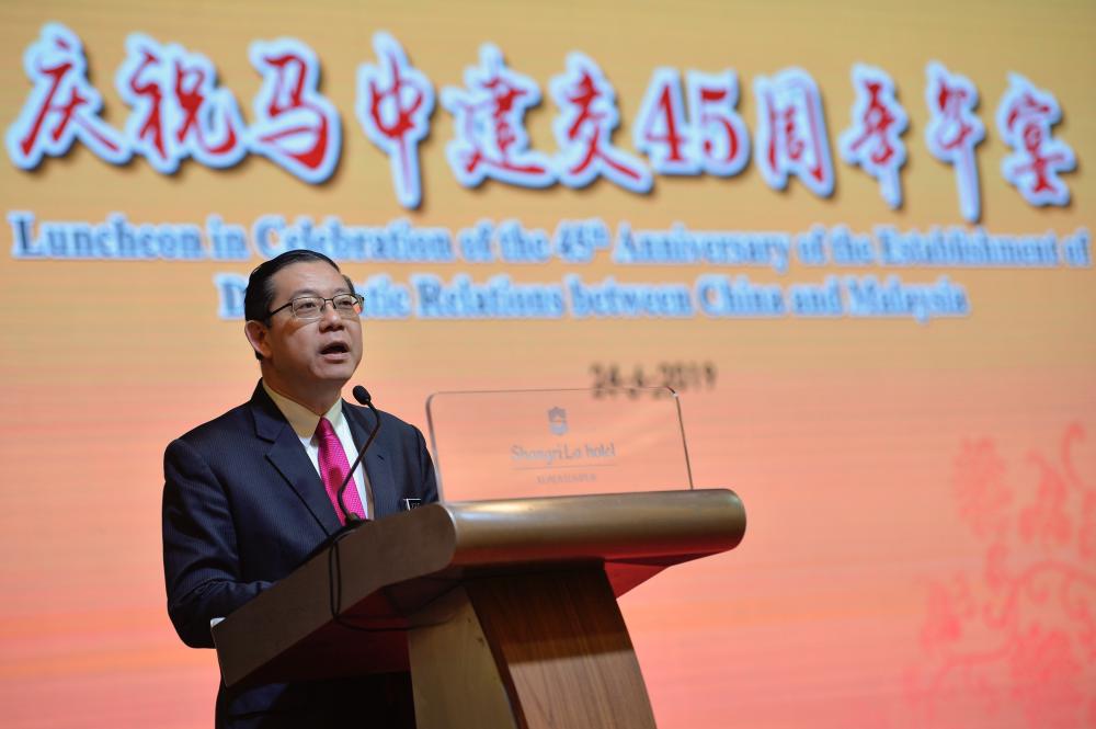 Finance Minister Lim Guan Eng today delivers a speech during a luncheon in conjunction with the celebration of the 45th anniversary of the establishment of diplomatic relations between Malaysia and China, organised by the Associated Chinese Chambers of Commerce and Industry of Malaysia (ACCCIM). - Bernama