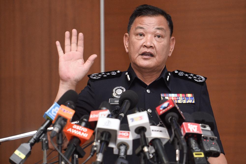 Inspector-General of Police Tan Sri Abdul Hamid Bador speaks during a press conference at Bukit Aman today. - Bernama
