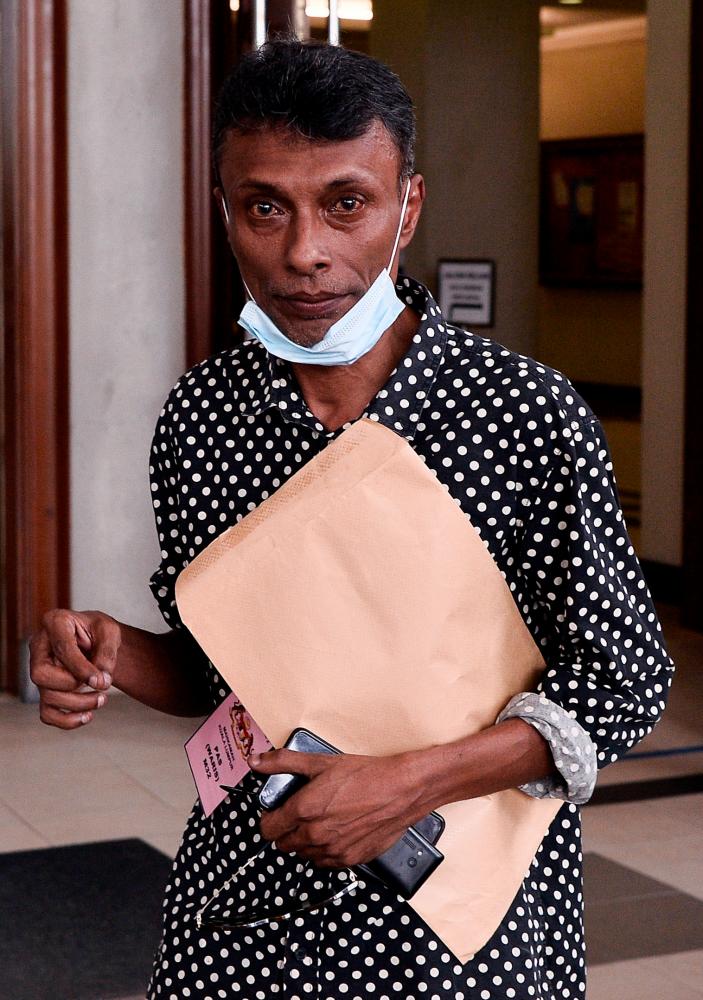 The brother of the late Datuk Anthony Kevin Morais, Datuk Richard Morais as he left the Kuala Lumpur High Court after hearing the verdict in the Morais murder case today. - Bernama