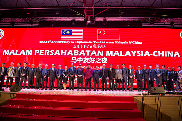 Transport Minister Anthony Loke Siew Fook pose for a photo with guests of the 45th Anniversary of Diplomatic ties between Malaysia and China, at Wisma Hua Zong, Seri Kembangan, last night.