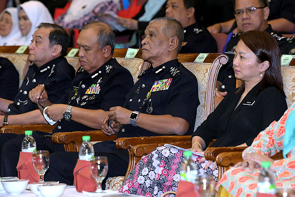 Women, Family and Community Development Ministry deputy minister Hannah Yeoh (R) sits with senior police officials during a forum on the increase in child abuse cases at Police Training College, Kuala Lumpur on Jan 10, 2019. — Bernama