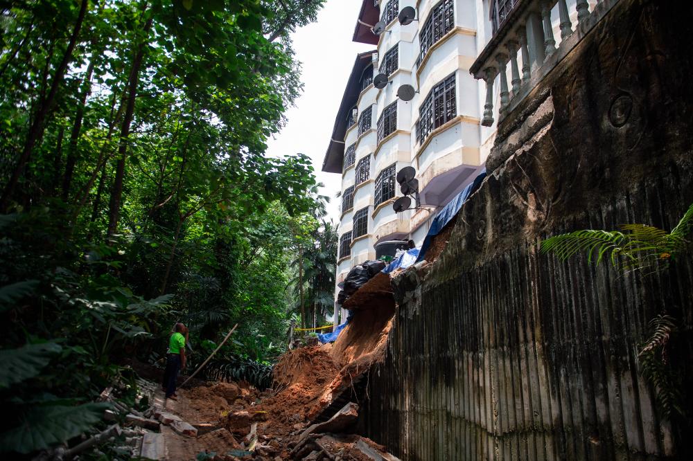 The site of the landslide at the Azalea Apartment site on Jalan Sri Penchala 1, Kampung Sri Penchala. - Bernama