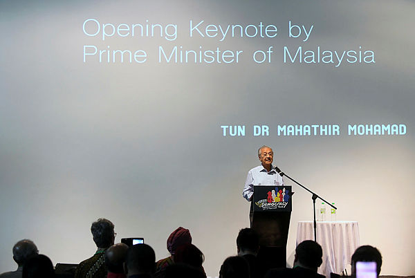 Prime Minister Tun Dr Mahathir Mohamad delivers his keynote address when opening Forsea Kuala Lumpur Democracy Festival 2019 on Feb 16, 2019. — Bernama