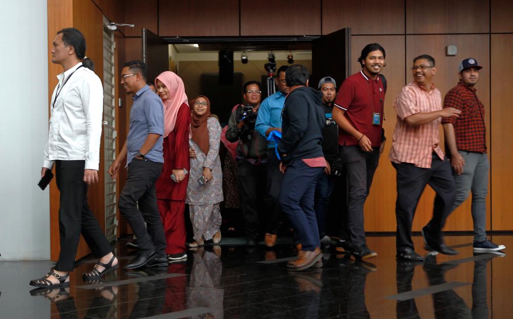 Utusan Melayu (Malaysia) Bhd employees exit a hall after a special briefing session with management at Utusan headquarters in Kuala Lumpur on Aug 20, 2019. - Bernama