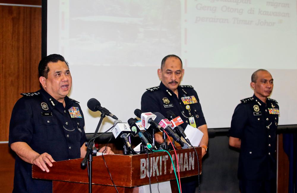 Federal police CID director Commissioner Datuk Huzir Mohamed speaks during a press conference at Bukit Aman today. - Bernama