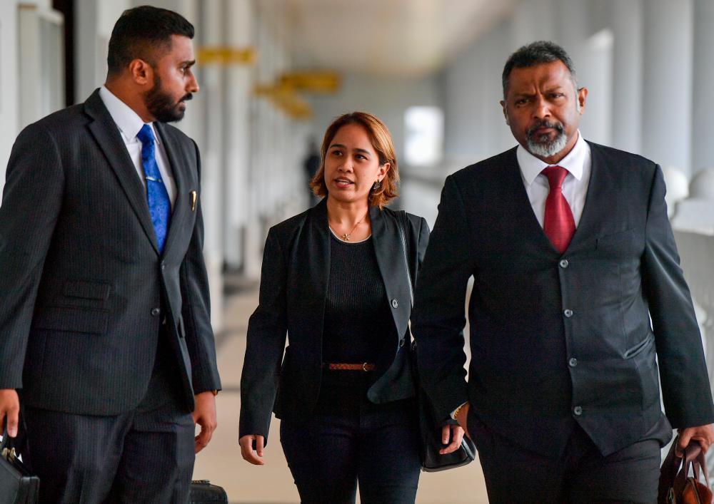 KUALA LUMPUR, April 17 -- Siti Nuramira Abdullah, 27, (centre) was fined RM8,000 by the Sessions Court today. BERNAMAPIX