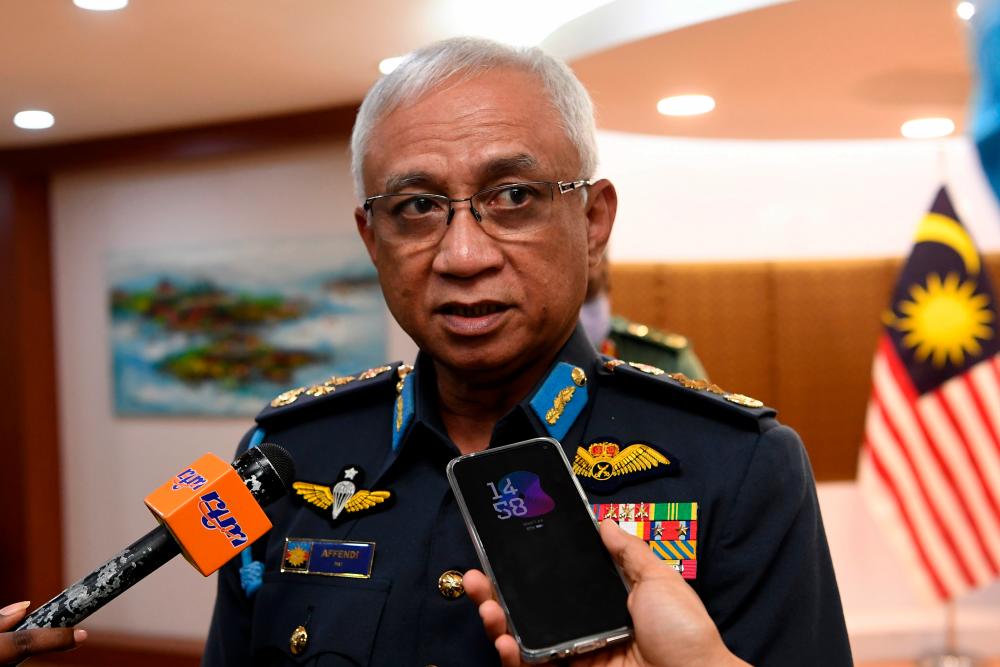 Chief of Defence Forces Gen Tan Sri Affendi Buang speaks to the press after receiving a donation of PPE for use by frontline personnel from PT Bayan Resources at Wisma Pertahanan today. - Bernama