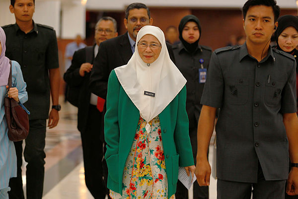 Deputy Prime Minister Datuk Seri Dr Wan Azizah Wan Ismail arriving for the Dewan Rakyat sitting at Parliament yesterday. — Bernama