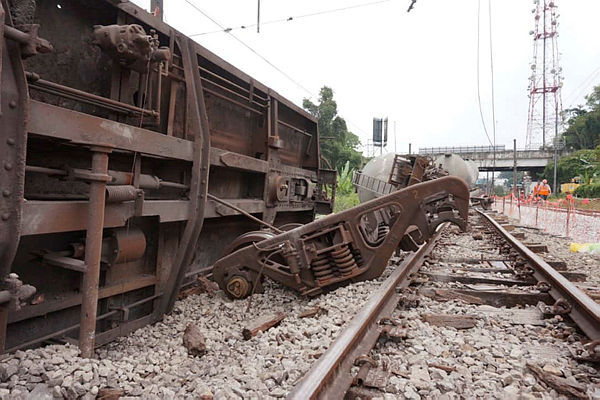 The sight of a derailed cargo train carrying cement near Rawang Station today.