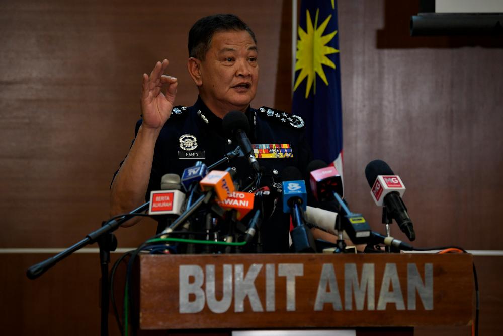 Inspector-General of Police Tan Sri Abdul Hamid Bador during press conference regarding current issues at Bukit Aman yesterday. — Bernama