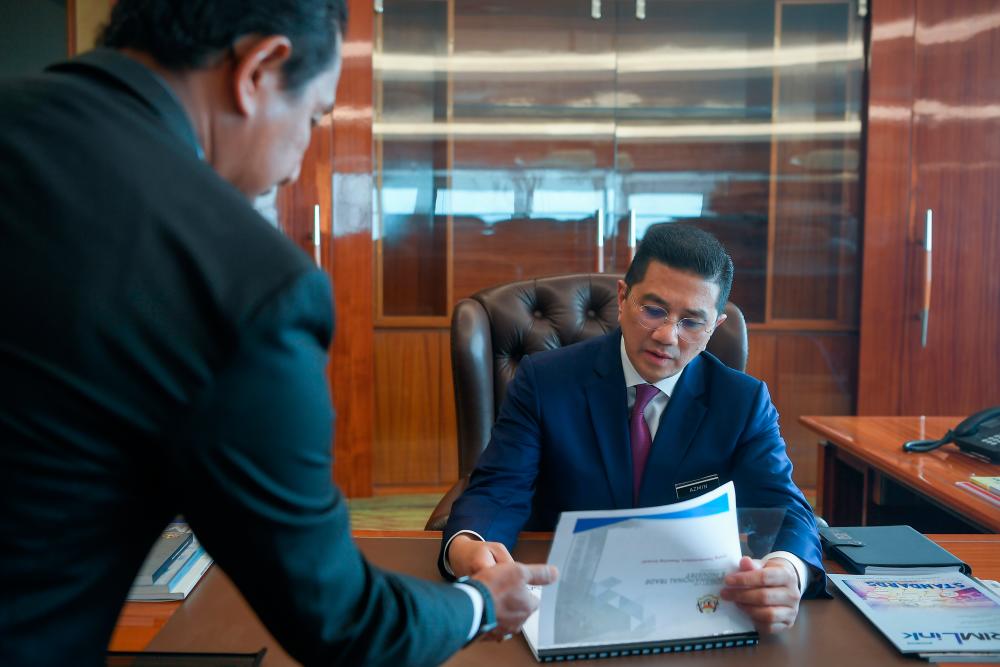 Senior Minister Datuk Seri Mohamed Azmin Ali commences his official duties at the Ministry of International Trade and Industry today. - Bernama