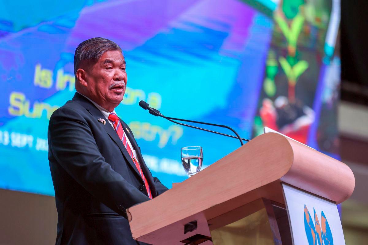 Minister of Agriculture and Food Security, Datuk Seri Mohamad Sabu, delivers his remarks while officiating the opening of the 4th World Irrigation Forum (WIF4), the 3rd High-Level Advisory Group Meeting, and the 76th International Executive Council Meeting here today. – BERNAMA