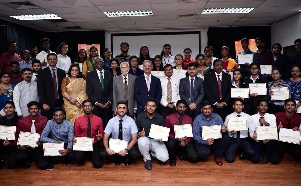 The High Commissioner of India to Malaysia, Mridul Kumar (center, seventh from left) poses for a group photo with students awarded the Indian Scholarship and Trust Fund (ISTF) during ISTF Felicitation Ceremony, on Dec 13, 2019. — Bernama