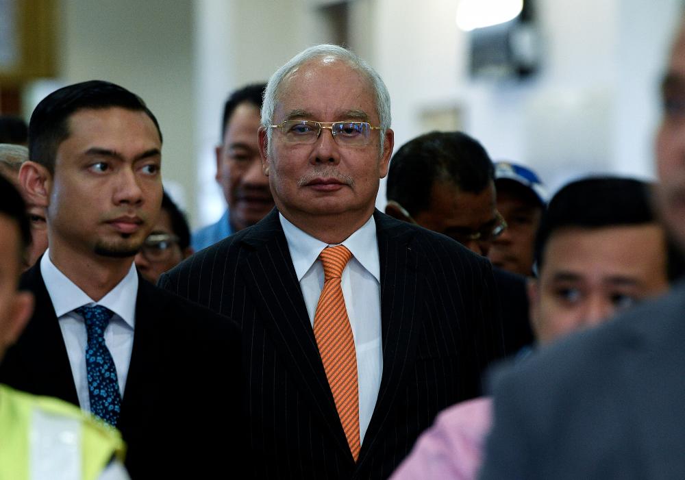Former prime minister Datuk Seri Najib Abdul Razak was ordered to enter his defence on seven charges of misappropriating RM42 million in SRC International Sdn Bhd funds, today.  - Bernama