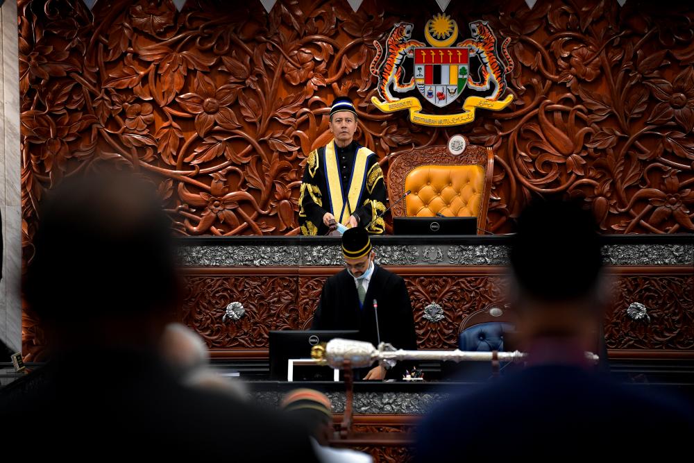 Newly-elected Dewan Rakyat Speaker Datuk Azhar Azizan Harun sworn in as the new Speaker at the second meeting of the third session of the 14th Parliament. - Bernama