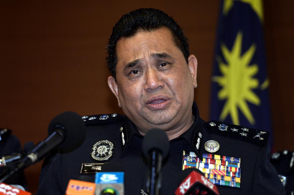 Federal police CID director Commissioner Datuk Huzir Mohamed speaks during a press conference at Bukit Aman today. - Bernama