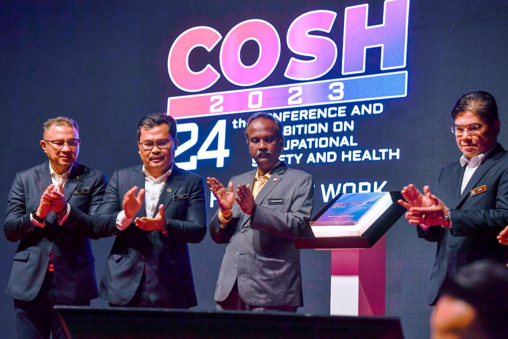 KUALA LUMPUR, March 21 -- Human Resources Minister V Sivakumar (third, left) at the Pre-Launching Ceremony of the Conference and Exhibition for Occupational Safety and Health (COSH 2023) and the Scientific Conference on Occupational Safety and Health (SciCOSH 2023) at the Kuala Lumpur Convention Center today. BERNAMAPIX