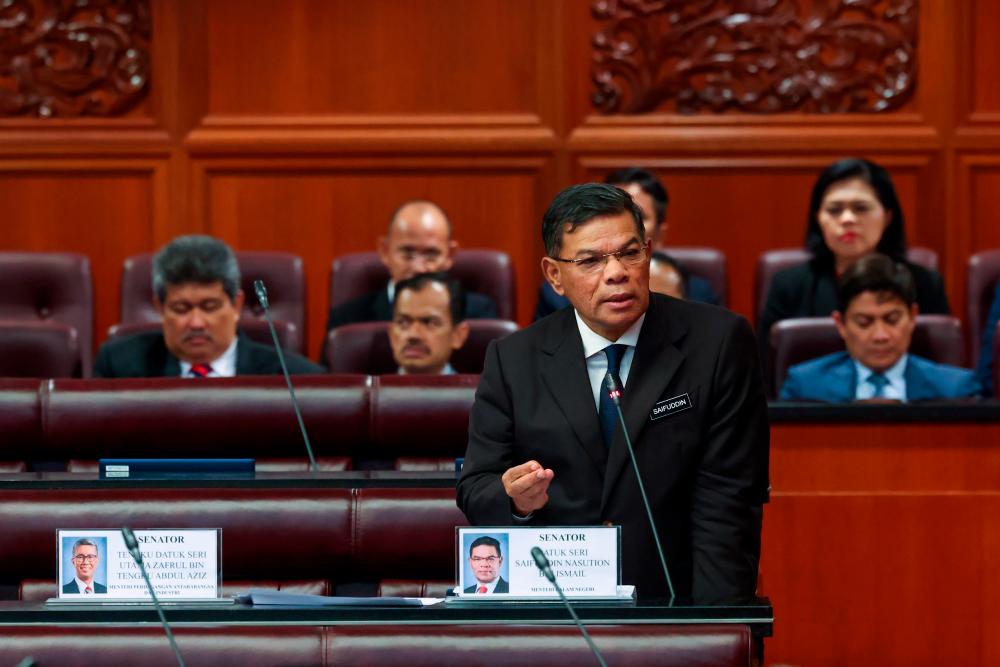 KUALA LUMPUR, 27 Mac -- Menteri Dalam Negeri Datuk Seri Saifuddin Nasution Ismail ketika penggulungan perbahasan Titah Diraja Dewan Negara di Bangunan Parlimen hari ini. fotoBERNAMA