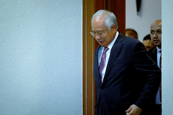 Former prime minister Datuk Seri Najib Abdul Razak leaves the KL Court Complex after his attending his money laundering and CBT trial involving SRC International, on April 23, 2019. — Bernama