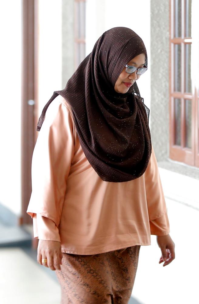 The sixth prosecution witness, Narimah Miswadi, an Affin Bank operations officer at the Jalan Bunus KL branch attends the third day of the trial of former deputy prime minister Datuk Seri Ahmad Zahid at the Kuala Lumpur Court Complex today. - Bernama