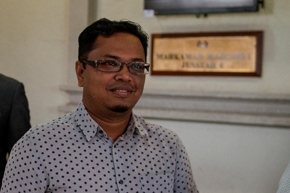 Shamsul Anuar Mohd Khairi, a deliveryman, appears at the Kuala Lumpur magistrates’ court today. - Bernama