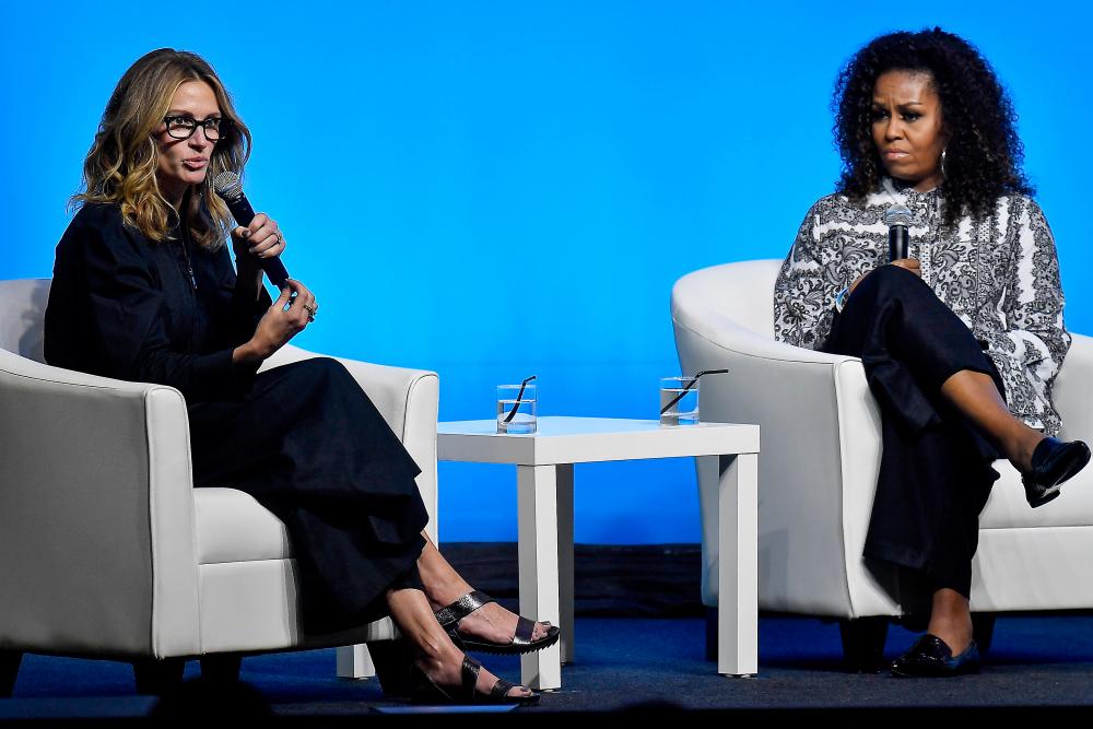 The former first lady of the United States, Michelle Obama (R) and actress Julia Roberts speak about the Girls Opportunity Alliance and the power of global girls' education at the plenary session on the third day of the Obama Foundation Leaders: Asia Pacific programme at Connexion Conference and Event Centre, Bangsar South today. - Bernama
