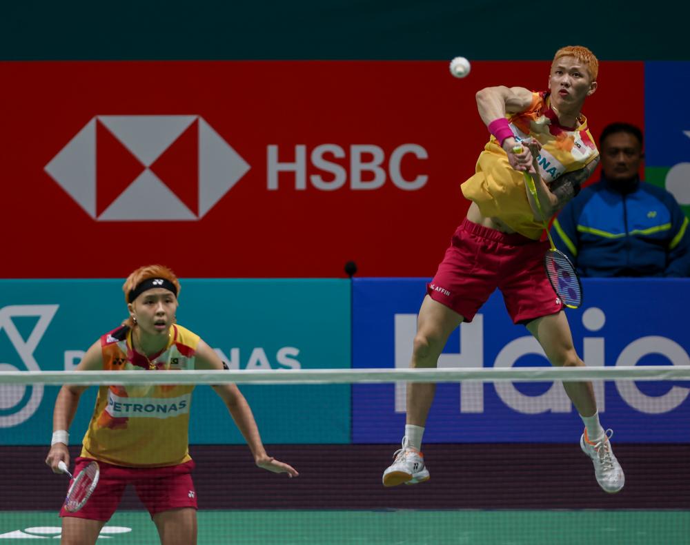 National mixed doubles pair Chen Tang Jie (right), Toh Ee Wei (left). - BERNAMAPIX