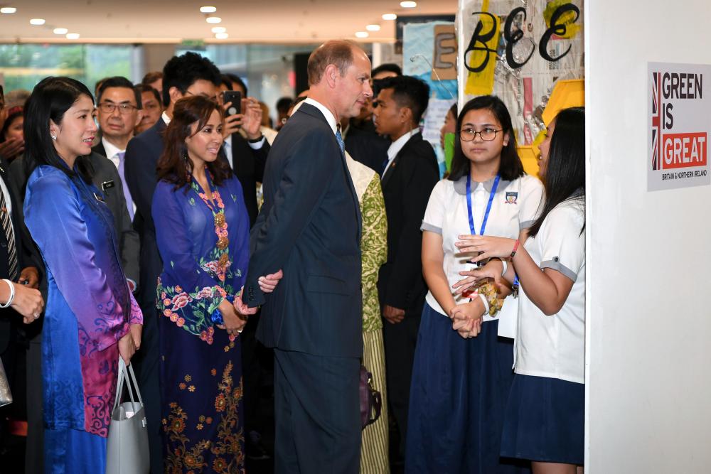 The Earl of Wessex Prince Edward listening to an explanation while visiting the exhibition area during the special reception and screening of BBC Studio Blue Planet II today.Also present Selangor Princess Tengku Zatashah Sultan Sharafuddin Idris Shah (second, left) and Energy, Science, Technology, Environment, and Climate Change Minister Yeo Bee Yin (left). — Bernama