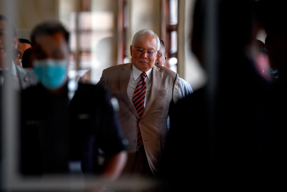 Bekas Perdana Menteri Datuk Seri Najib Abdul Razak didapati bersalah terhadap ketujuh-tujuh pertuduhan melibatkan pecah amanah jenayah (CBT), pengubahan wang haram dan menyalahgunakan kuasa melibatkan RM42 juta dana SRC International Sdn Bhd. - Bernama