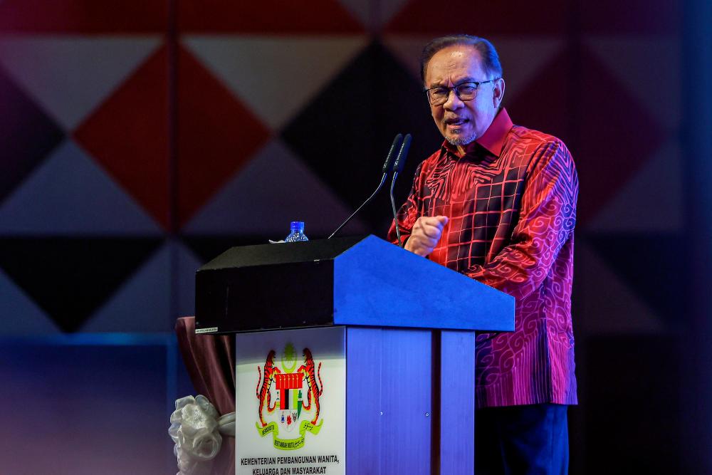 PM Datuk Seri Anwar Ibrahim delivering a speech at the 2024 International Women’s Day Celebration at the Sunway Pyramid Convention Center yesterday. - BERNAMApix