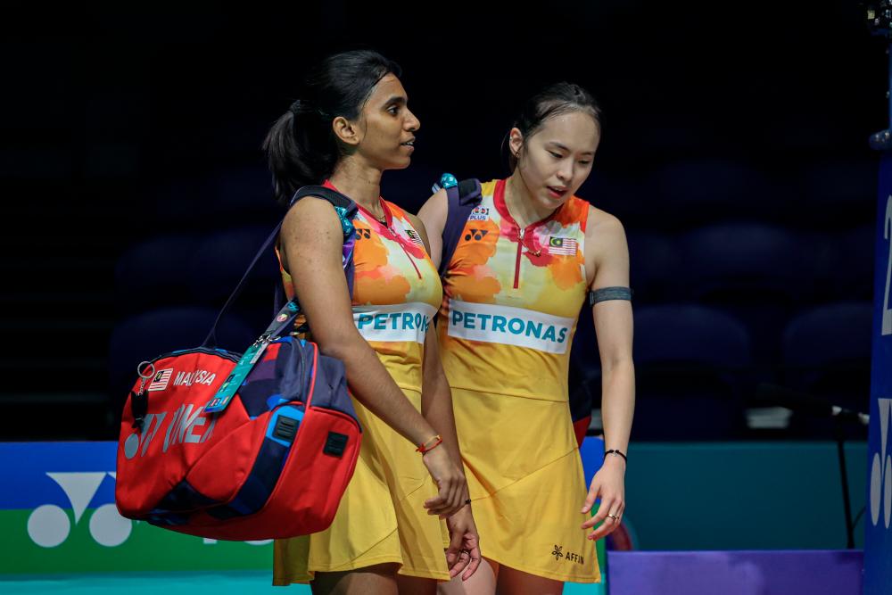 National women’s doubles pair Pearly Tan-M. Thinaah