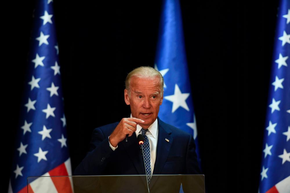 US Vice President Joe Biden delivers a speech during a press conference with Kosovo's President as part of his visit in Pristina on Aug 17, 2016. — AFP