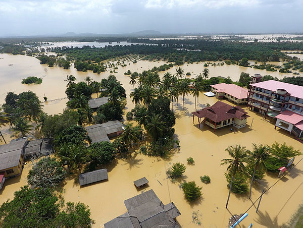 An aerial view of Kampung Nyatuh, Setiu which is still partially submerged by flood waters — Bernama