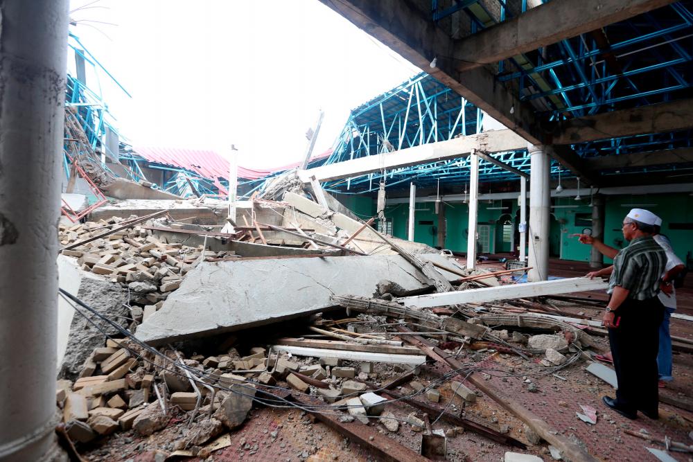 Part of the roof structure of Haji Muhammad mosque collapsed during a storm at Kampung Mengabang Tengah in Kuala Terengganu on May 8, 2019. — BBX