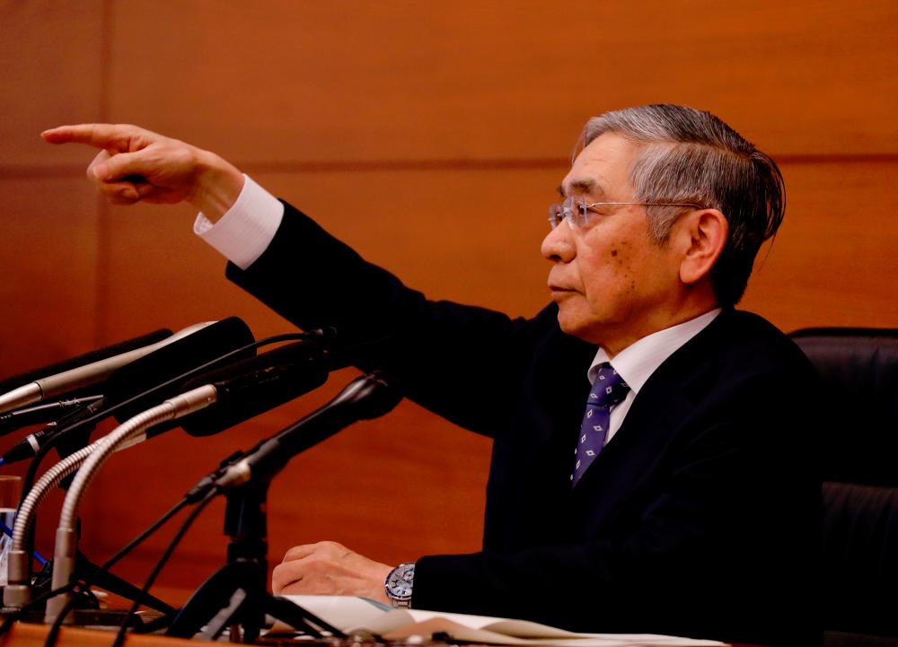 Kuroda at the briefing in Tokyo today. – REUTERSPIX