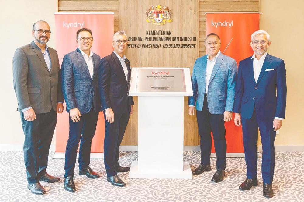 From left: Kyndryl Asean and India government affairs and policy head Parminder Singh Kakria, Kyndril Asean managing director Andrew Lim, Tengku Zafrul, Effendi Azmi and InvestKL CEO Datuk Muhammad Azmi Zulkifli.