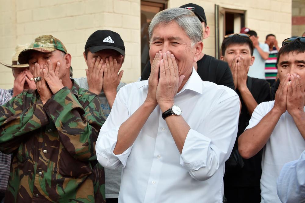Former Kyrgyz president Almazbek Atambayev meets with supporters in the village of Koi-Tash near the capital Bishkek on June 26, 2019. — AFP