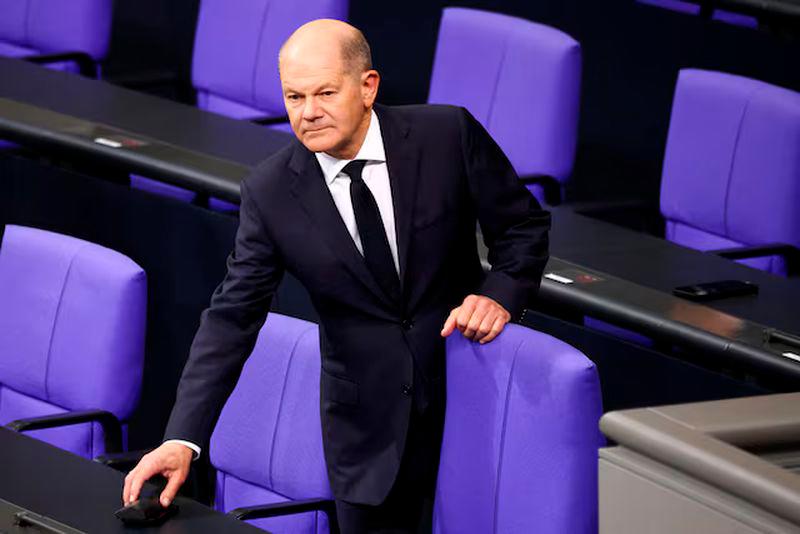 German Chancellor Olaf Scholz reacts at the lower house of parliament, Bundestag in Berlin - REUTERSpix