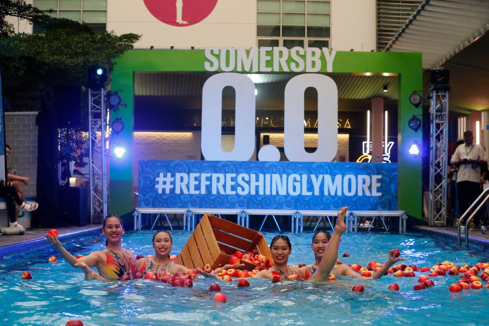Former National Synchronised swimmers - Stephanie Gan, Zylane Lee, Tiffany Gan and Stella Gan perform during the launch. $!Former National Synchronised swimmers - Stephanie Gan, Zylane Lee, Tiffany Gan and Stella Gan perform during the launch.