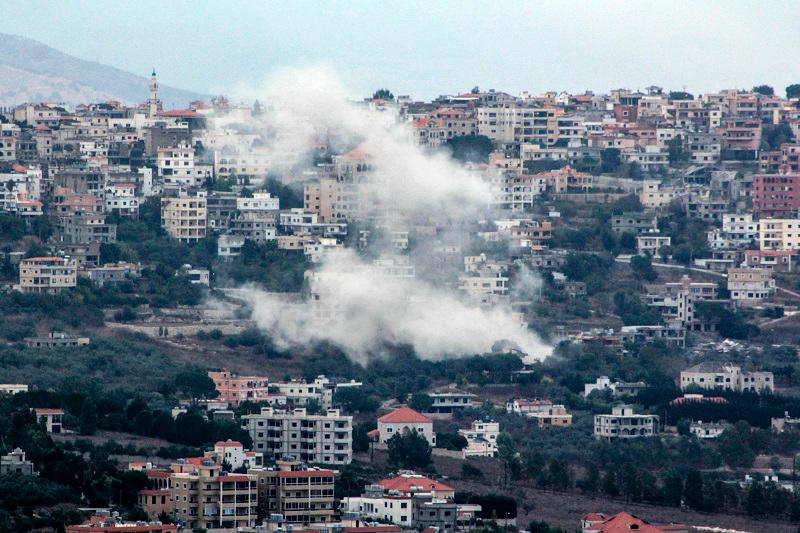 Smoke billows from the site of an Israeli strike that targeted the southern Lebanese village of Khiam on September 22, 2024. The Israeli army said that more than 100 projectiles were fired from Lebanon on September 22 and in response to the incoming fire from Hezbollah, it had launched new strikes on the group’s targets in southern Lebanon. - AFPpix