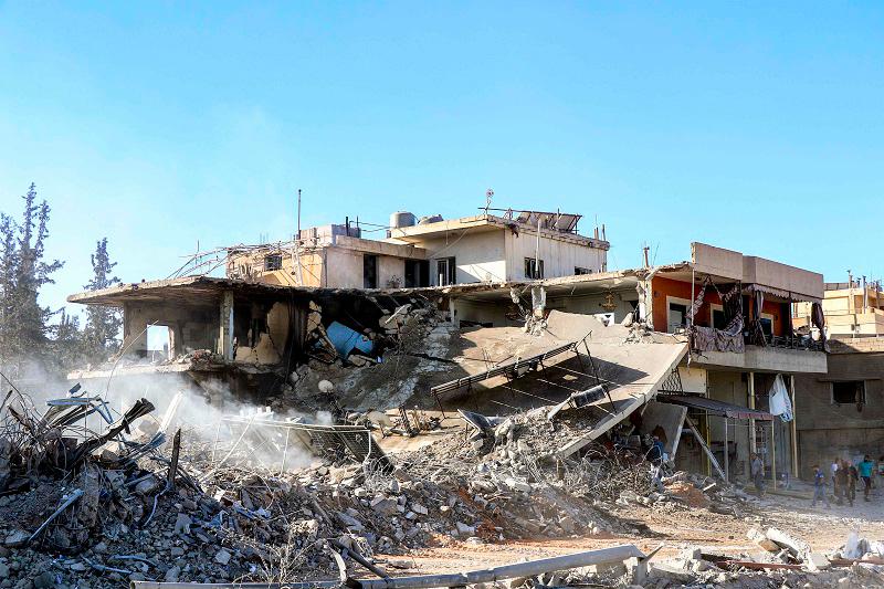 A destroyed building is pictured following an Israeli air strike in the village of Douris southeast of Baalbek in Lebanon’s eastern Bekaa Valley on October 15, 2024. Israel expanded operations in Lebanon nearly a year after Hezbollah began exchanging fire in support of its ally, Hamas, following the Palestinian group’s deadly attack on Israel on October 7, 2023. . - Nidal SOLH / AFP