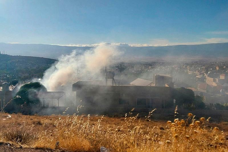 Smoke billows from a house in Baalbek in east Lebanon after a reported explosion of a radio device, on September 18, 2024, amid ongoing cross-border tensions between Israel and Hezbollah fighters. Communication devices exploded on July 18 in Hezbollah strongholds in Lebanon, as the Iran-backed group vowed to retaliate against Israel after a deadly wave of pager blasts that has raised fears of an all-out war. - AFPpix