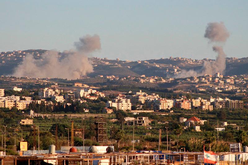 This picture taken from the southern Lebanese city of Tyre shows smoke billowing after Israeli airstrikes that targeted southern Lebanese villages on October 19, 2024, amid the ongoing war between Israel and Hezbollah. - Kawnat HAJU / AFP